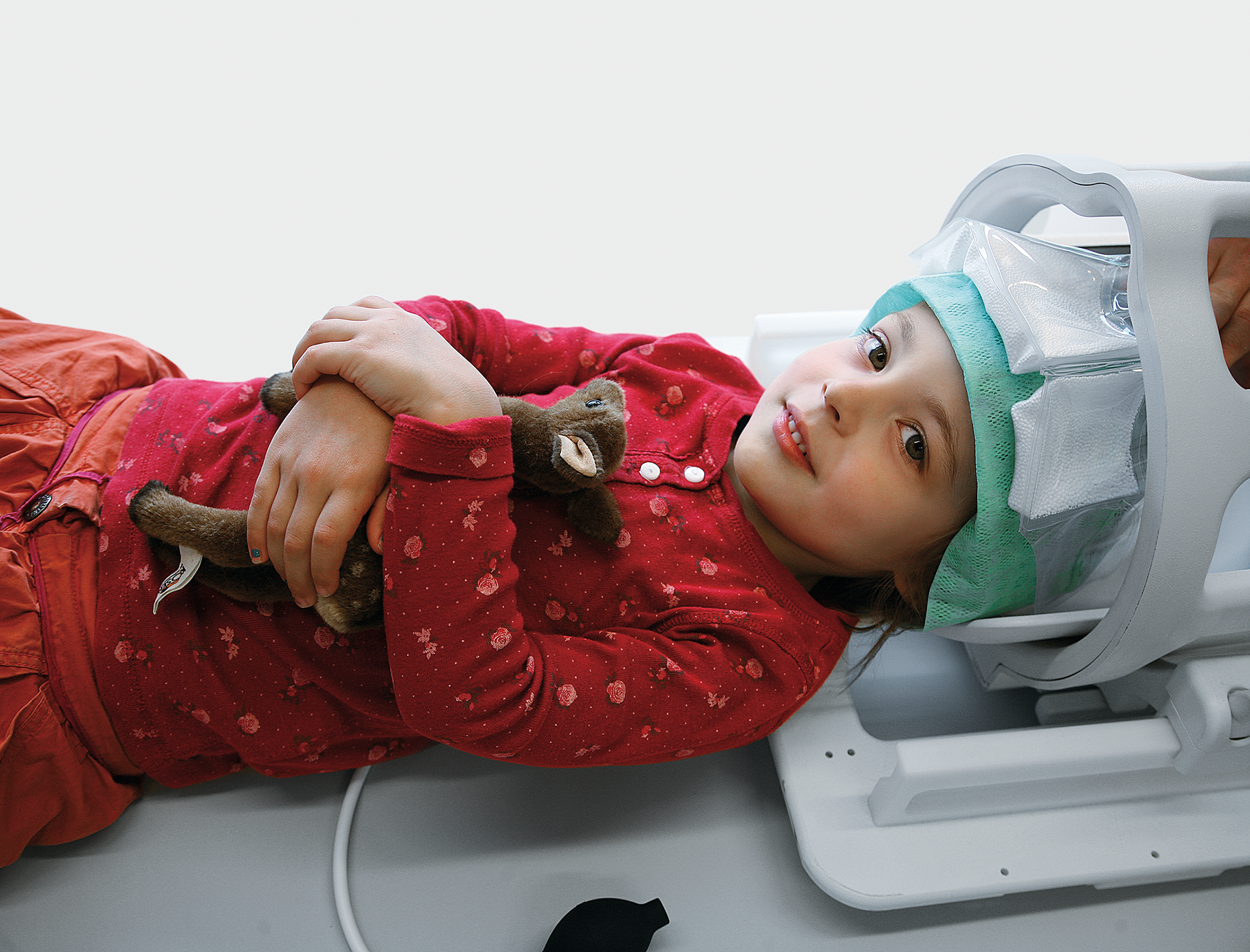 Child in MRI headcoil with Crania positioning aid