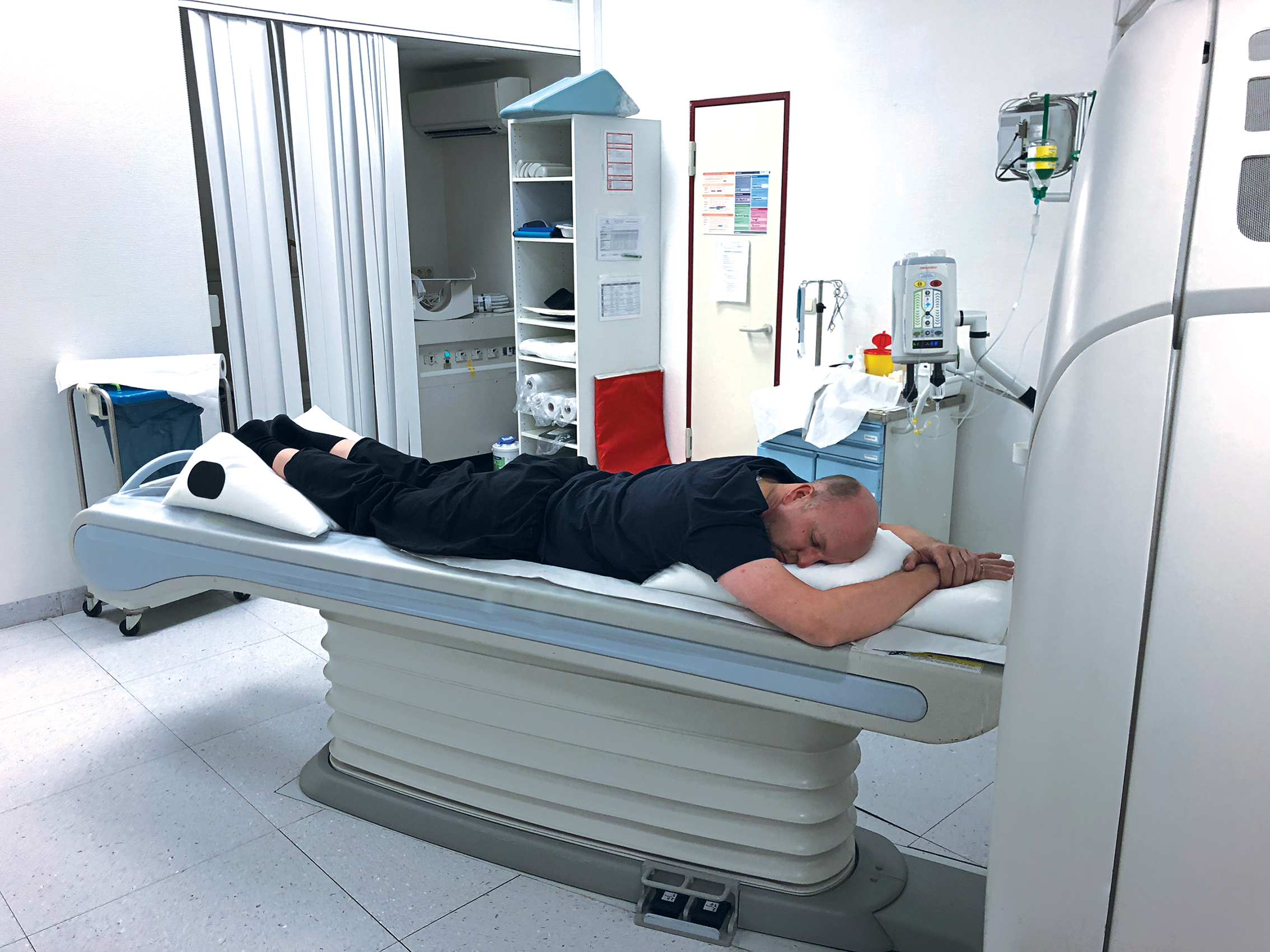 Patient in prone position on CT using various PearlFit products